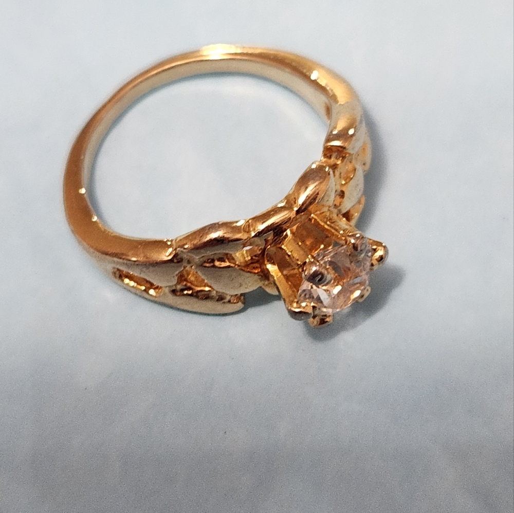 Elegant Gold-Tone Ring with Crystal Accent